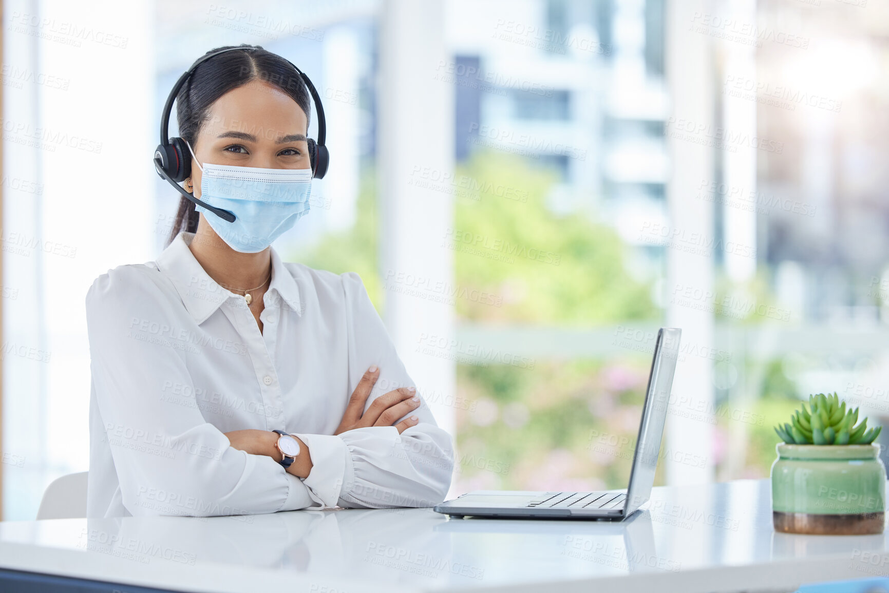 Buy stock photo Covid, compliance and healthcare consultant in a call center with ready to help medical clients with insurance. Woman, employee and contact support worker in safety face mask with headset and mic