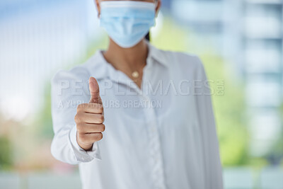 Buy stock photo Thumbs up, success and woman with covid at work in an office. Corporate employee, manager or worker in support, agreement and happy with business working at a startup marketing company with face mask