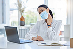 Covid, neck pain and a woman with laptop and face mask in office. Online work, overtime and a tired businesswoman at desk with hand on neck. Stress, injury and anxiety, lady working during pandemic.