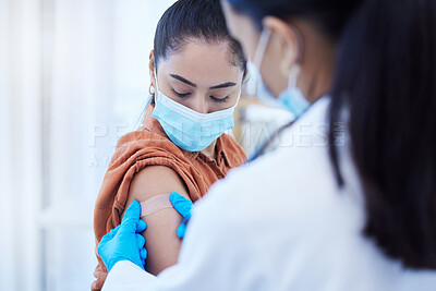 Buy stock photo Covid vaccine, doctor and patient with face mask for safety, compliance and healthcare at a hospital or clinic. Woman with medical worker expert in office consultation for corona virus medicine help
