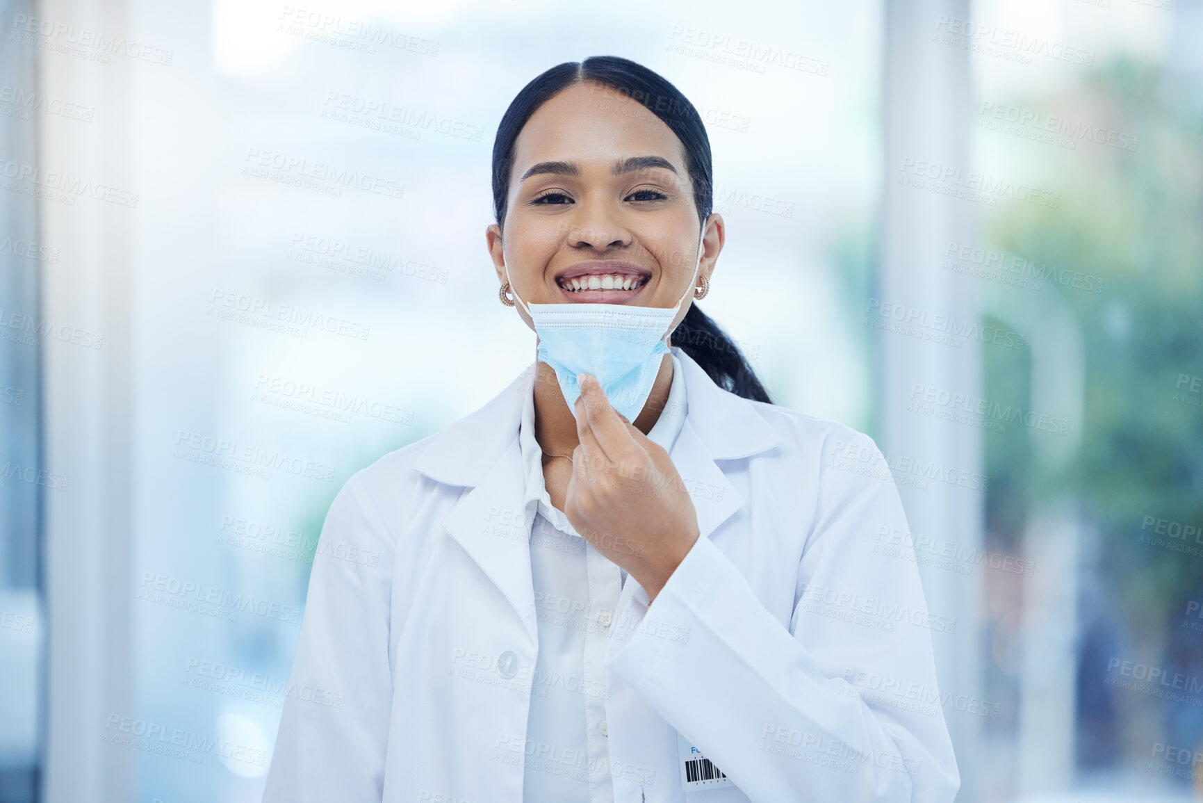 Buy stock photo Covid, healthcare and happy portrait of doctor woman in professional Mexico clinic with smile. Optimistic medical expert remove face mask protection at end of coronavirus health pandemic.

