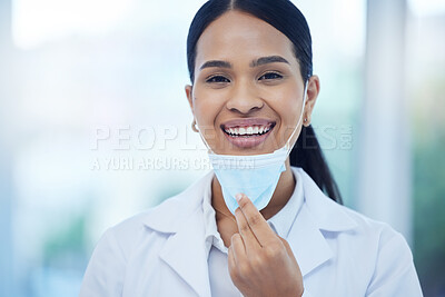 Buy stock photo Doctor, woman and smile with mask in portrait while at work in hospital for health, safety and wellness against covid 19. Medic, ppe and happy working in clinic, breathing and end of pandemic