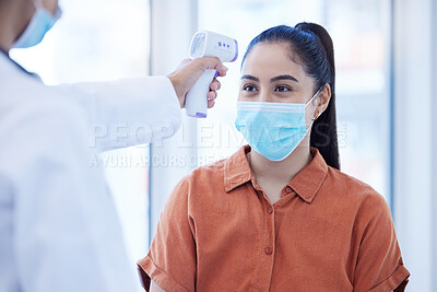 Buy stock photo Covid doctor check woman thermometer for fever, sickness and flu test analysis in clinical surgery. Face mask patient, forehead laser and healthcare consulting corona virus safety in medical hospital