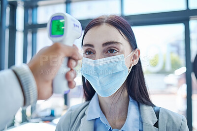 Buy stock photo Covid, thermometer and woman doing check for health, virus and healthcare in an office at work. Face of an employee, corporate worker or person doing compliance test with face mask at company