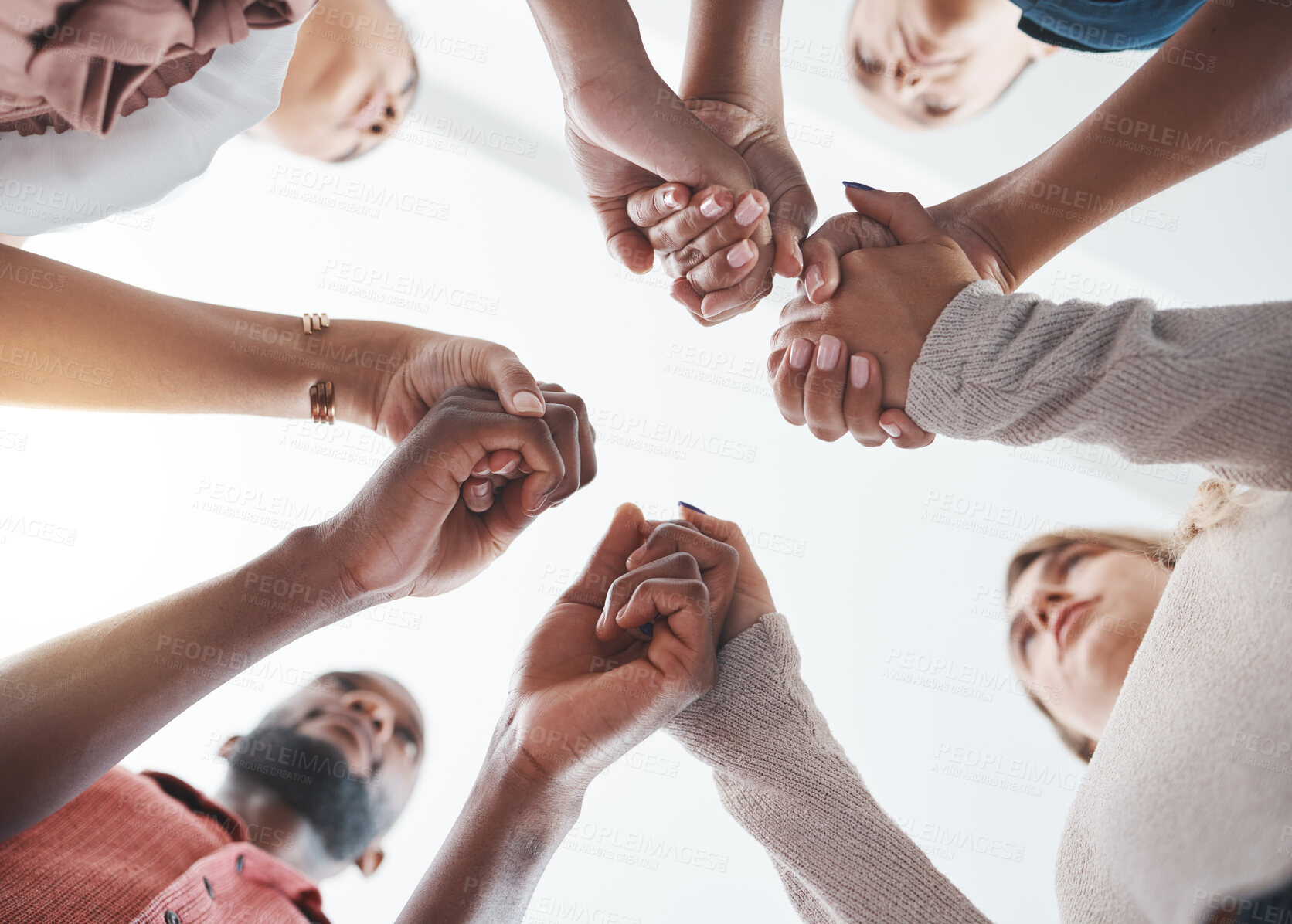 Buy stock photo Community, holding hands or psychology support diversity in mental health workshop, mind or therapy. Zoom on low angle men, women or people in friends trust circle in hope, motivation or anxiety help