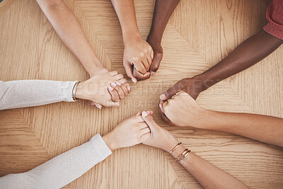 Buy stock photo Holding hands, faith and prayer support group of people or friends with hope, religion and trust or respect. Together, helping and love community with commitment, solidarity and teamwork from above
