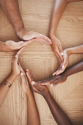 Buy stock photo Diversity, teamwork and creative hands in synergy of employee workers together in collaboration at work. Table group of people hand in circle unity for agreement, help and team for community