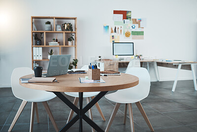 Buy stock photo Empty office, laptop and documents in digital marketing space, advertising startup or creative small business. Furniture, technology and paper research in design workplace with table, desk and chairs