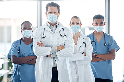 Buy stock photo Doctor, nurse and leadership, covid with face mask for team safety with arms crossed in a medical hospital. Proud, professional and motivated healthcare workers fight covid at clinic together