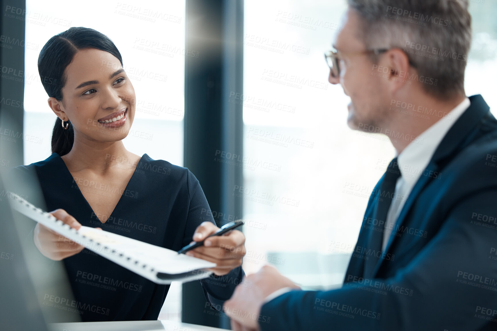 Buy stock photo Business meeting, partnership and giving a contract to sign at office. Black woman with documents, paperwork and pen to businessman for signature. Partner, collaboration and corporate team at work