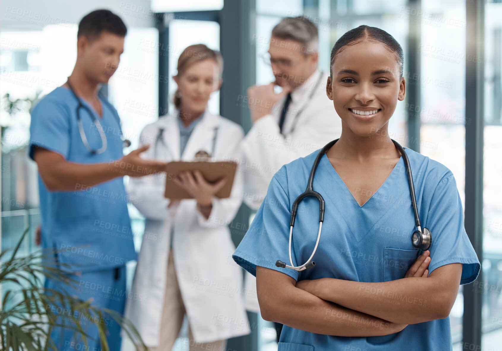 Buy stock photo Doctor, team and portrait of black woman in the hospital or clinic and smile on face. Teamwork, collaboration and leadership in healthcare, medical care and working in a clinic with nurse and doctors