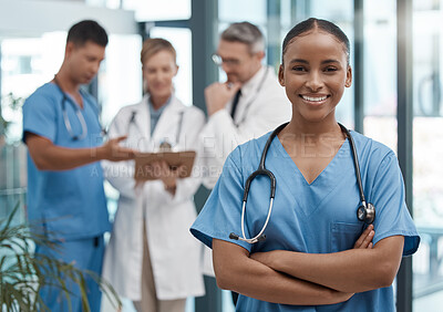 Buy stock photo Doctor, portrait or black woman nurse with vision, motivation or leadership in hospital with team. Happy medical healthcare, wellness worker with smile at work for insurance or medicine in clinic