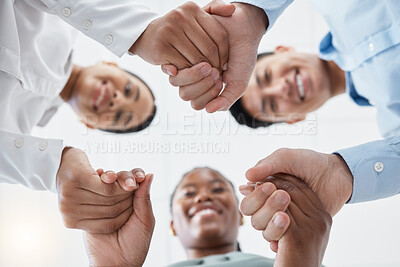 Buy stock photo Diversity, support and collaboration of business people holding hands below in trust for company success. Team of corporate workers in a circle of success in a meeting together at a corporate company
