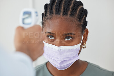Buy stock photo Face mask, thermometer and covid with doctor, medical expert and healthcare worker in clinic, hospital or wellness center. Black woman or patient with medical checking fever to prevent disease