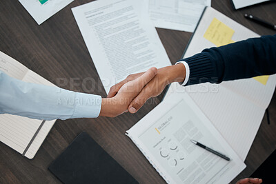 Buy stock photo Business, hands and handshake with documents above paperwork for employment agreement or analysis at the office. Hand of people in partnership shaking for corporate contract, welcome or b2b meeting