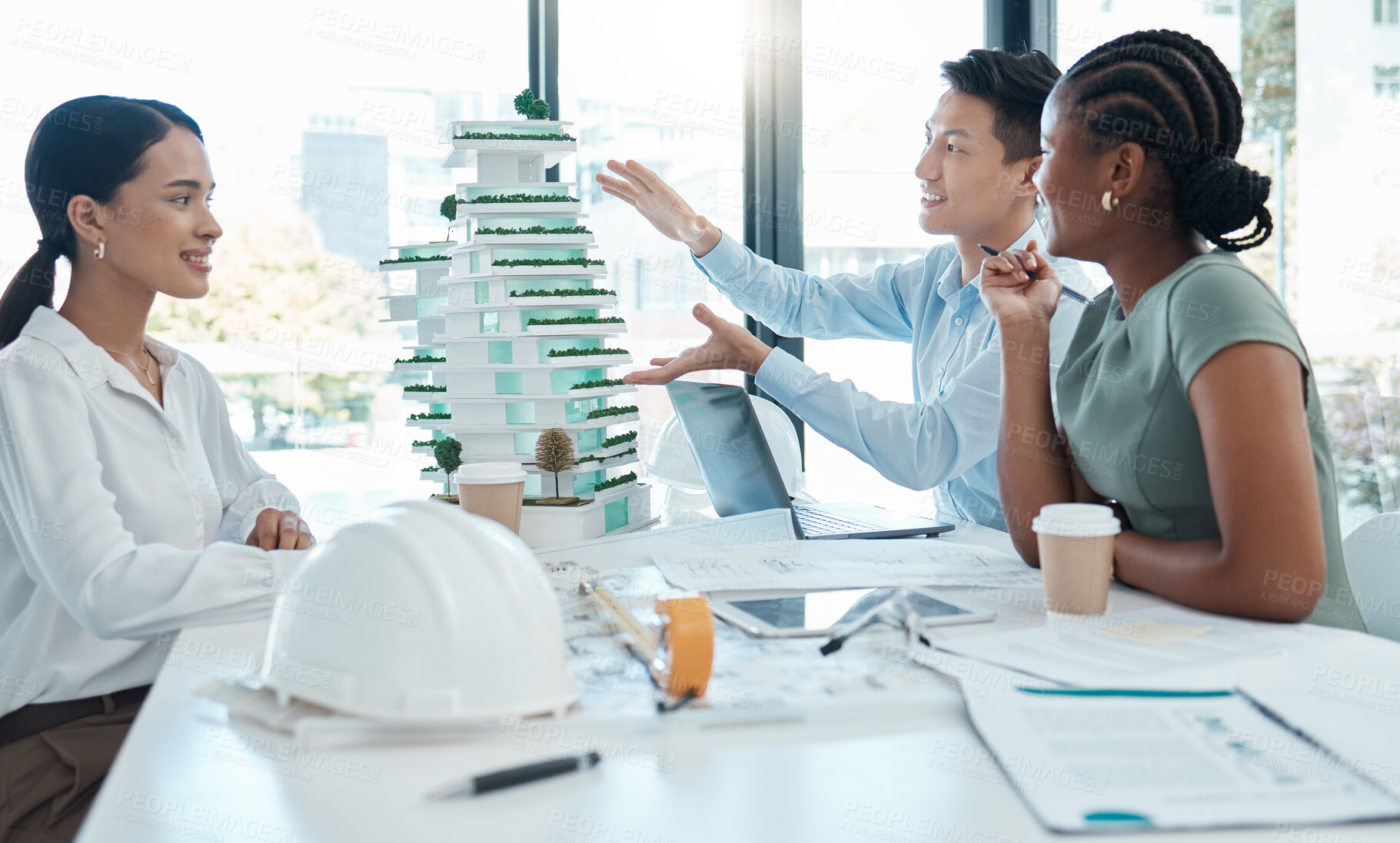 Buy stock photo Model, construction and architects planning a building project together in an office at work. Creative, corporate and architecture workers talking about a design with a 3d structure in a meeting