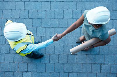 Buy stock photo Architect partnership, client handshake and construction worker meeting at building site, property deal or engineering trust. Above industrial contractor shaking hands, agreement or design consulting