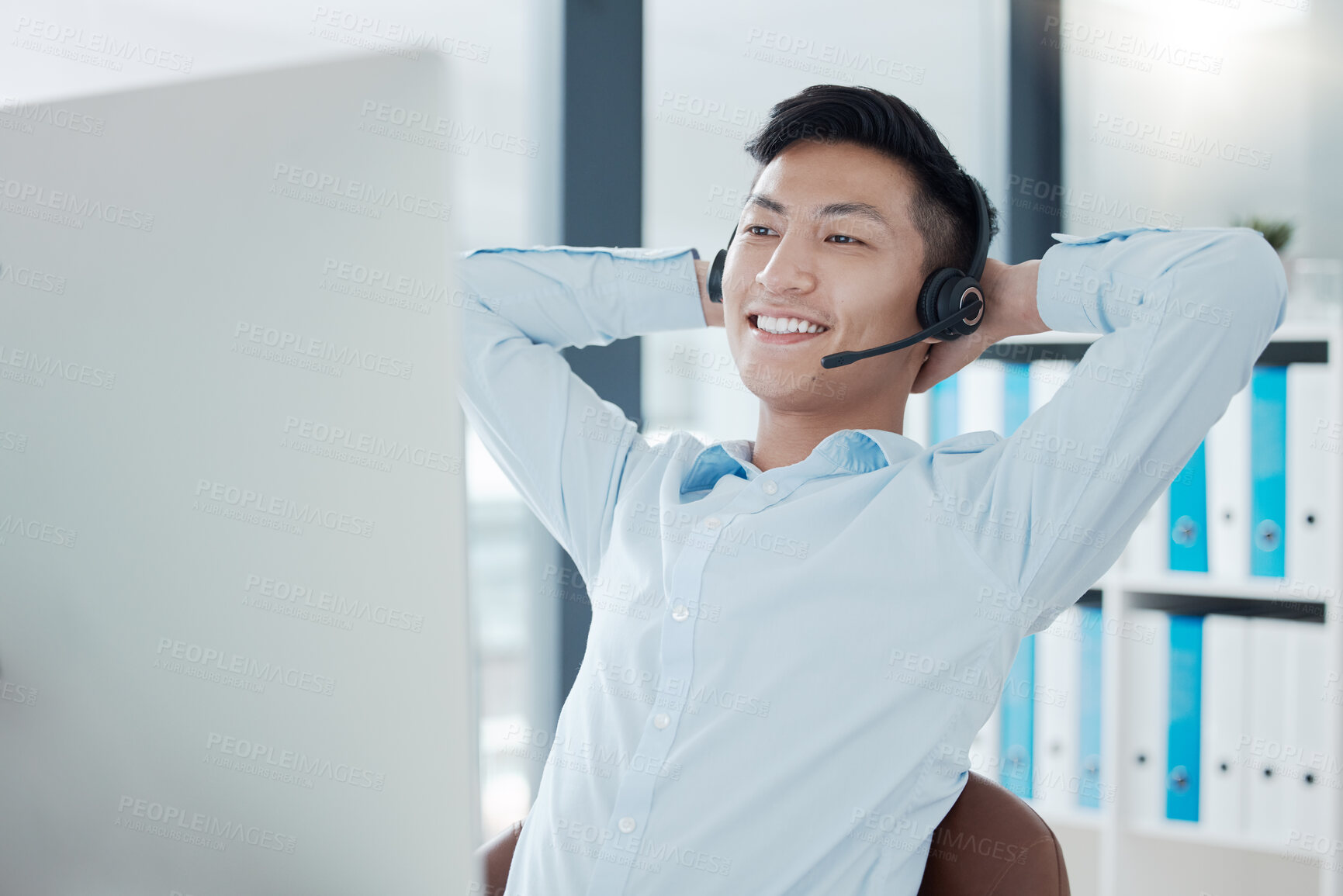 Buy stock photo Call center, computer or relax man in success sales deal, customer support crm or consulting help in Vietnamese b2b office. Happy smile, telemarketing or contact us technology receptionist stretching