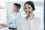 Woman, call center and smile consultant in office, workspace and with headset for customer conversation. Telemarketing, female worker and working girl talking, discussion or help client in workplace.