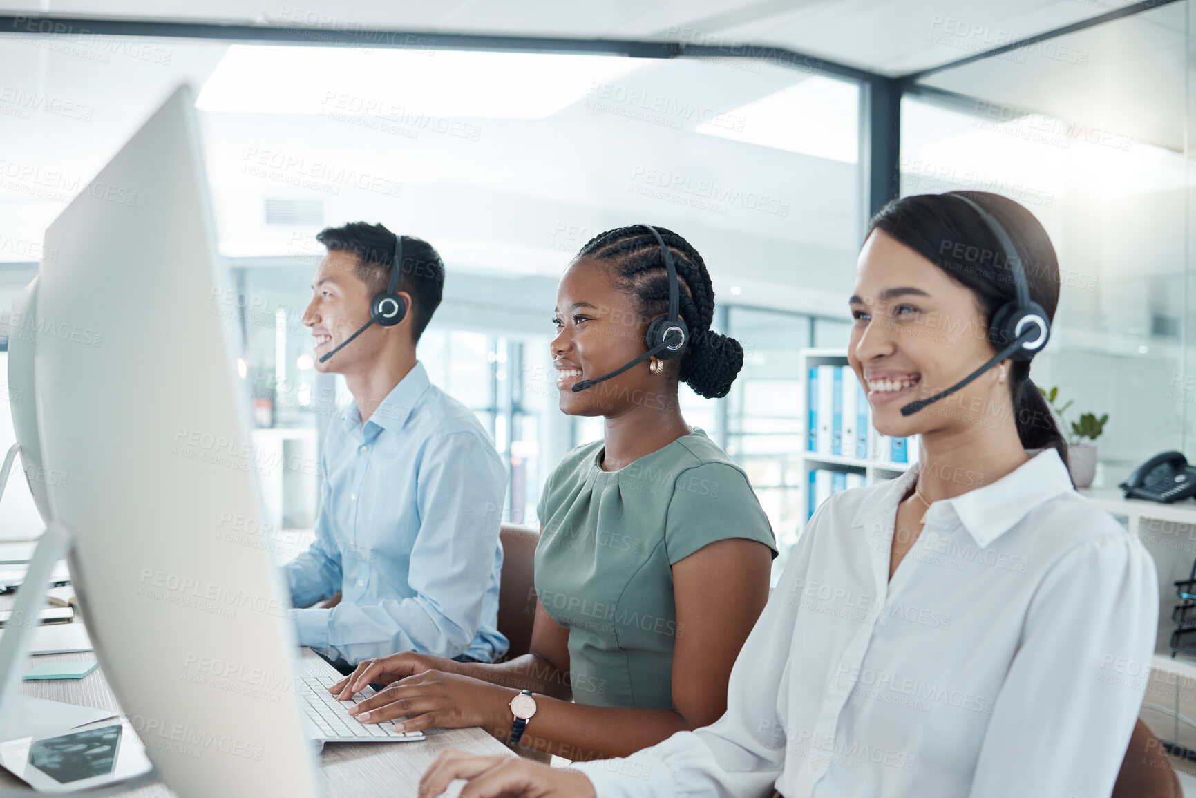 Buy stock photo Call center, telemarketing or customer support consultants working on computer in a modern office. Diversity, crm and happy employees consulting for ecommerce, sales and customer service with tech.