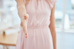 Woman hand, handshake gesture and office for welcome to a new recruit, partnership or agreement. Closeup of a professional female manager with a shaking hands offer for deal, greeting or thank you.