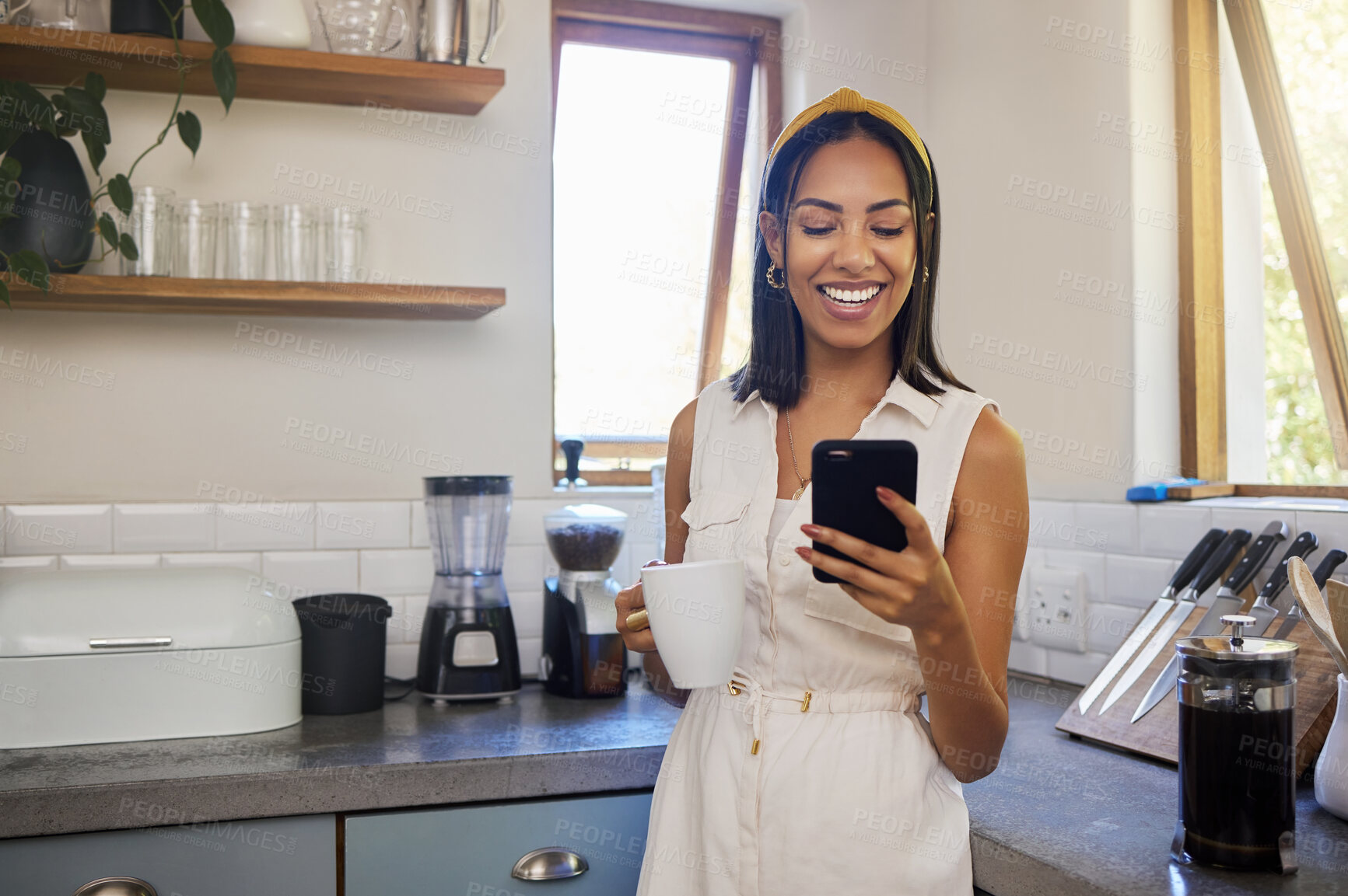 Buy stock photo Coffee break, smartphone and black woman in kitchen with mobile app notification, online networking or funny social media post in morning. Happy gen z girl using phone for website quote information