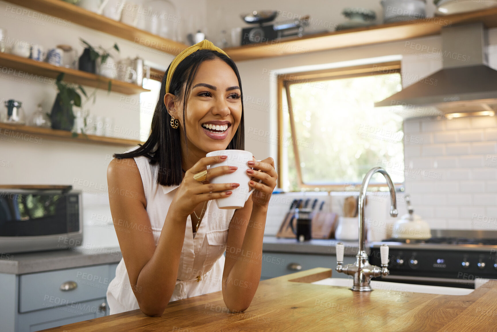 Buy stock photo Happy woman, coffee or tea in home kitchen and relax with a smile in the morning at house. Calm young person, smiling at peace and tea drink to wake up to start day with positive joyful thoughts