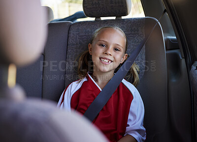 Buy stock photo Soccer, travel and girl in a car with a happy, excited and big smile for a sports training match exercise for kids. Road, safety and young child traveling in a vehicle to a weekend football trip