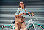 Summer, smile and girl with bicycle in the city, happy expression on face standing in road. Fashion, beauty and young girl with trendy clothes laughing with bike. Student in urban street on weekend 