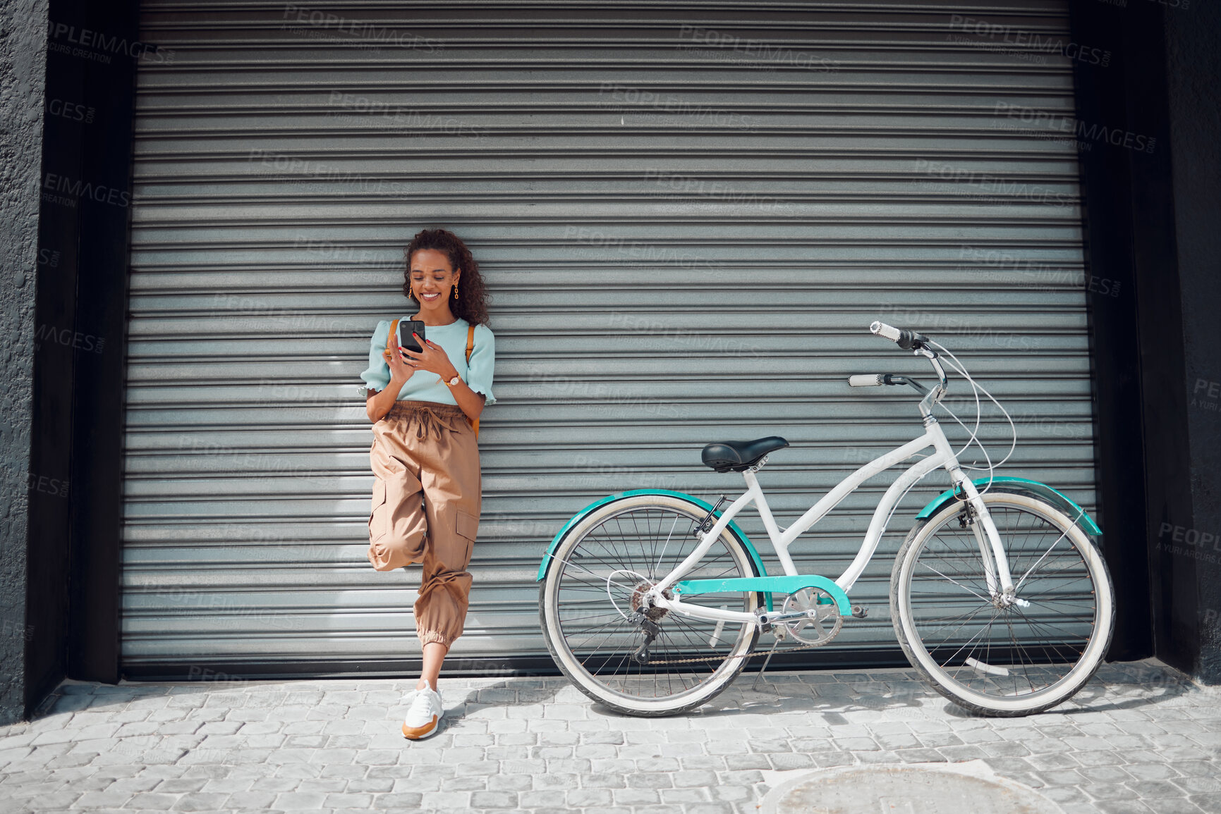 Buy stock photo Phone, bicycle and girl on social media in the city searching for cool, funky and trendy online content outdoors. Smile, bike and happy woman texting on a social network for cycling on the internet