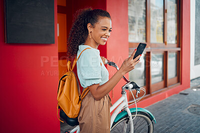 Buy stock photo Phone, bike and travel with a woman on social media while pushing her bicycle through the city on a trip. Mobile, cycling and transport with a young female traveling abroad or overseas alone