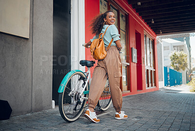 Buy stock photo Happy, city and girl with a bicycle to travel to school, university or college to reduce carbon footprint outdoors. Smile, street and young student traveling or riding a cool bike in an urban town