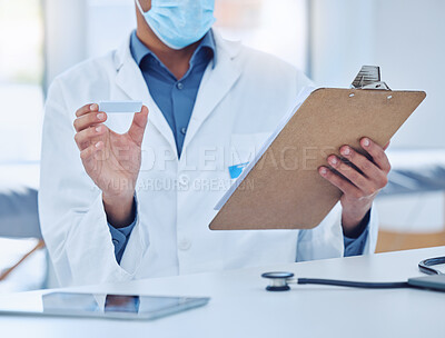 Buy stock photo Doctor hands check covid rapid antigen clipboard test results in healthcare hospital, medical risk and safety. Closeup corona virus surgeon, science worker and clinic research notes of pcr cassette