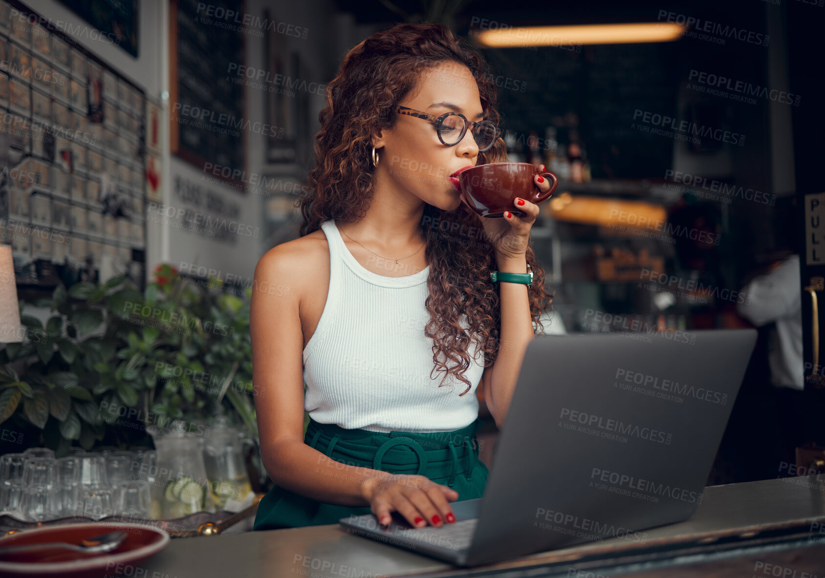 Buy stock photo Coffee, laptop and freelance with a woman entrepreneur doing remote work from an internet cafe. Computer, email and small business with a female working on a report, email or proposal in a restaurant