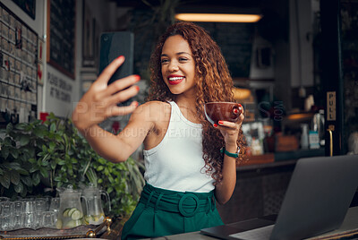 Buy stock photo Phone selfie, laptop and black woman with coffee, remote worker or freelancer drinking espresso in cafe. Tea, photo and business woman from Brazil with 5g mobile for happy memory or social media post
