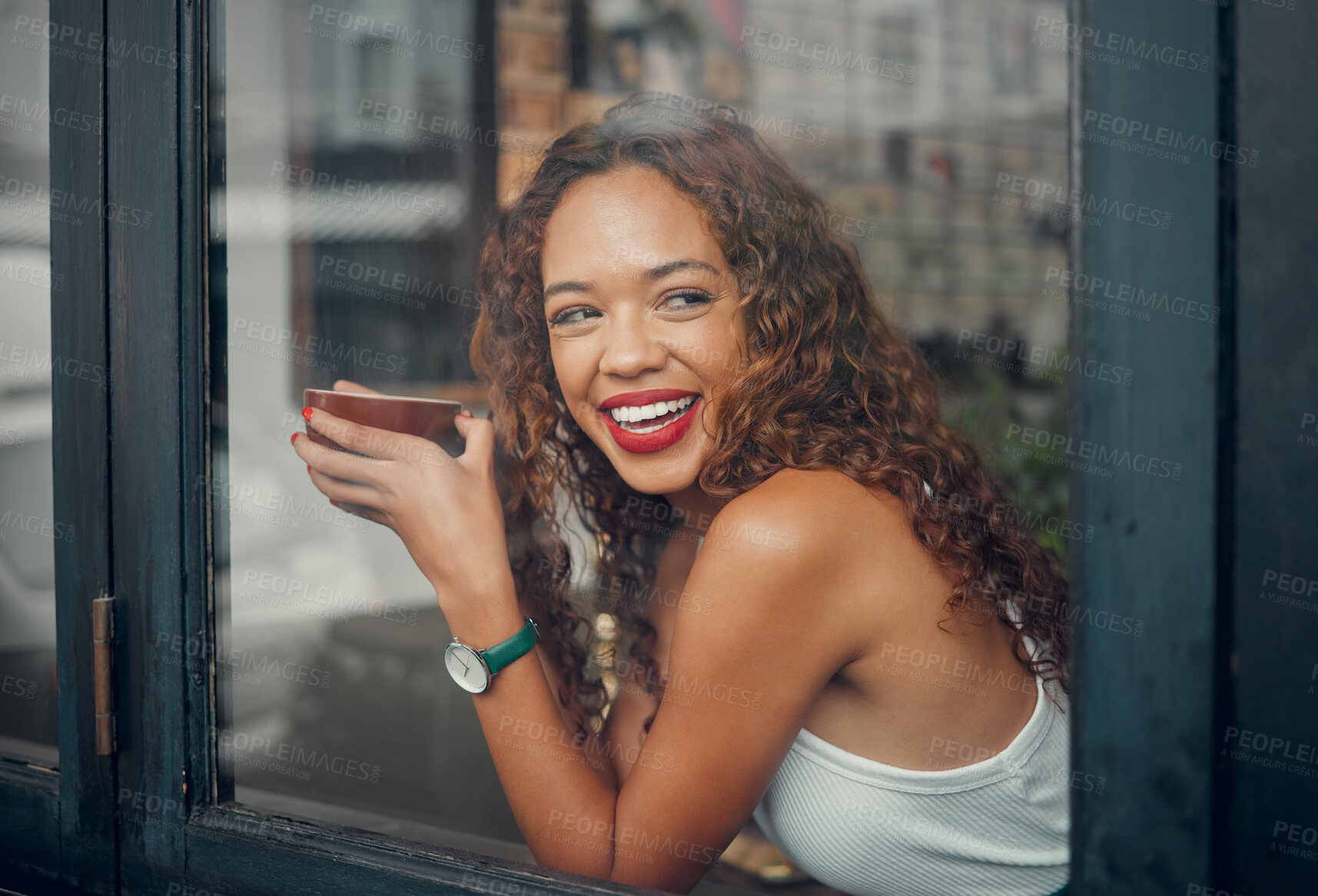 Buy stock photo Coffee shop, window and drink with a black woman in a restaurant to relax alone on the weekend. Cafe, happy and face with a young African American female drinking from a mug or cup with a smile