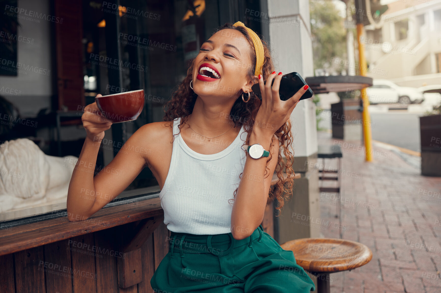 Buy stock photo Black woman in cafe, listening to audio message on 5g smartphone and laughing alone in San Francisco. Funny call recording sound, drinking tea in city street restaurant and happy in coffee shop