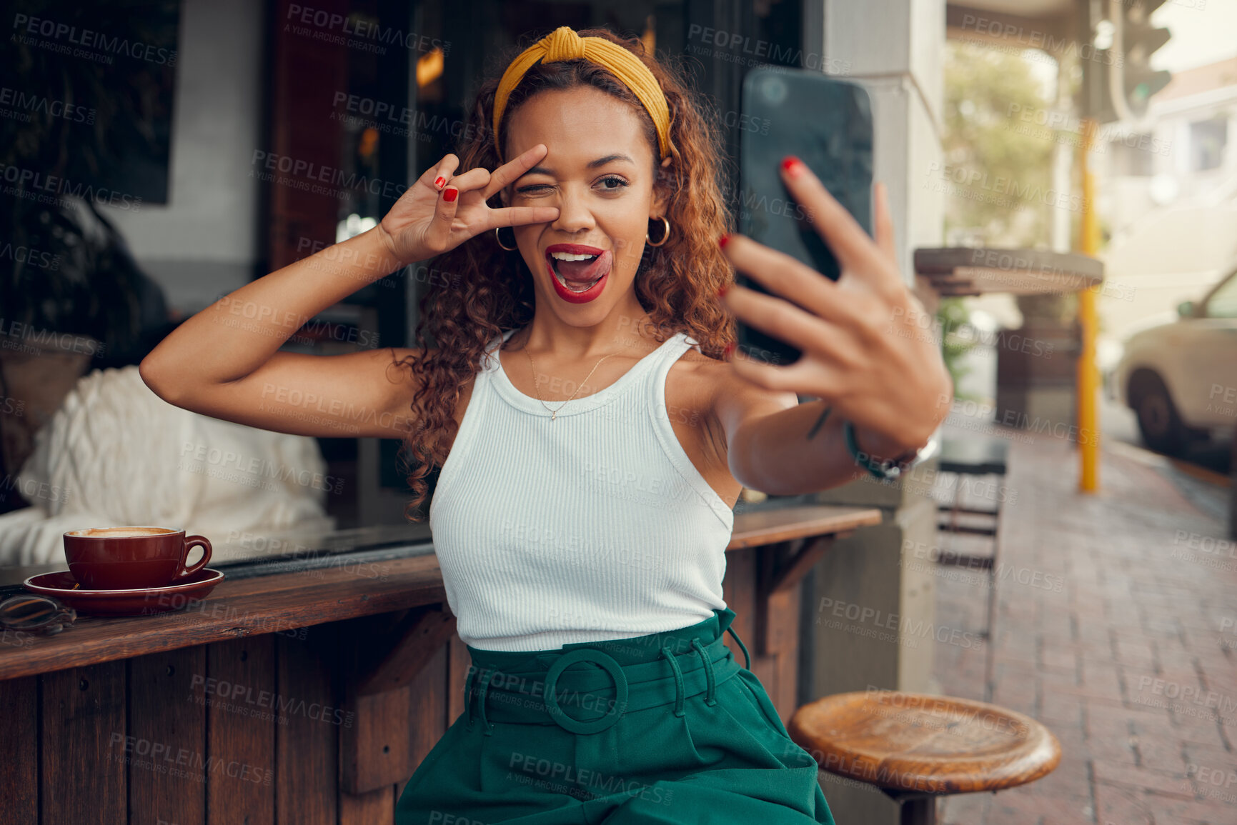 Buy stock photo Coffee shop, selfie and black woman with peace hand sign on smartphone for social media post, internet marketing and gen z lifestyle. Cafe, restaurant and influencer customer with cellphone portrait