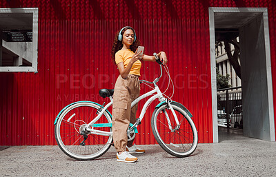 Buy stock photo Woman, bike and phone in city travel with music headphones, 5g podcast or radio. Thinking model, mobile and fashion student on eco friendly, carbon footprint or future Colombian environment transport