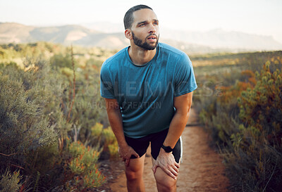 Buy stock photo Tired runner, man running on nature park trail fitness training exercise and cardio health for a summer marathon. Sport athlete run workout, rest on natural road and train for sports race competition