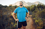 Nature hiking, run and fitness workout of a man on a calm morning on a mountain park running trail. Health exercise, training and healthy person outdoor on a walking or runner break in the mountains