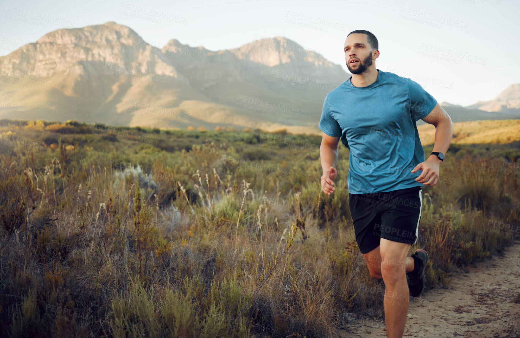 Buy stock photo Fitness, mountain and man running in nature training for health, wellness and sports workout. Exercise, lifestyle and marathon with athlete runner for summer, freedom and stamina on grass field path