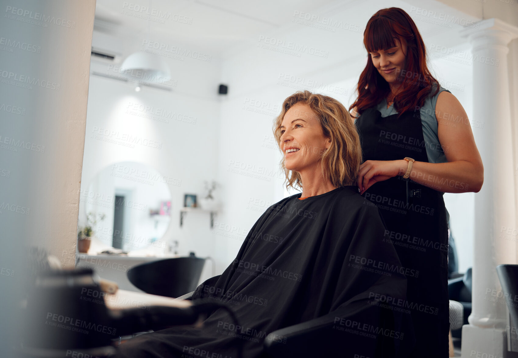 Buy stock photo Beauty, hairdresser and happy customer at a salon for grooming, fancy and beautiful makeover. Smile, wellness and professional stylist working on an elegant senior client or mature woman in Canada