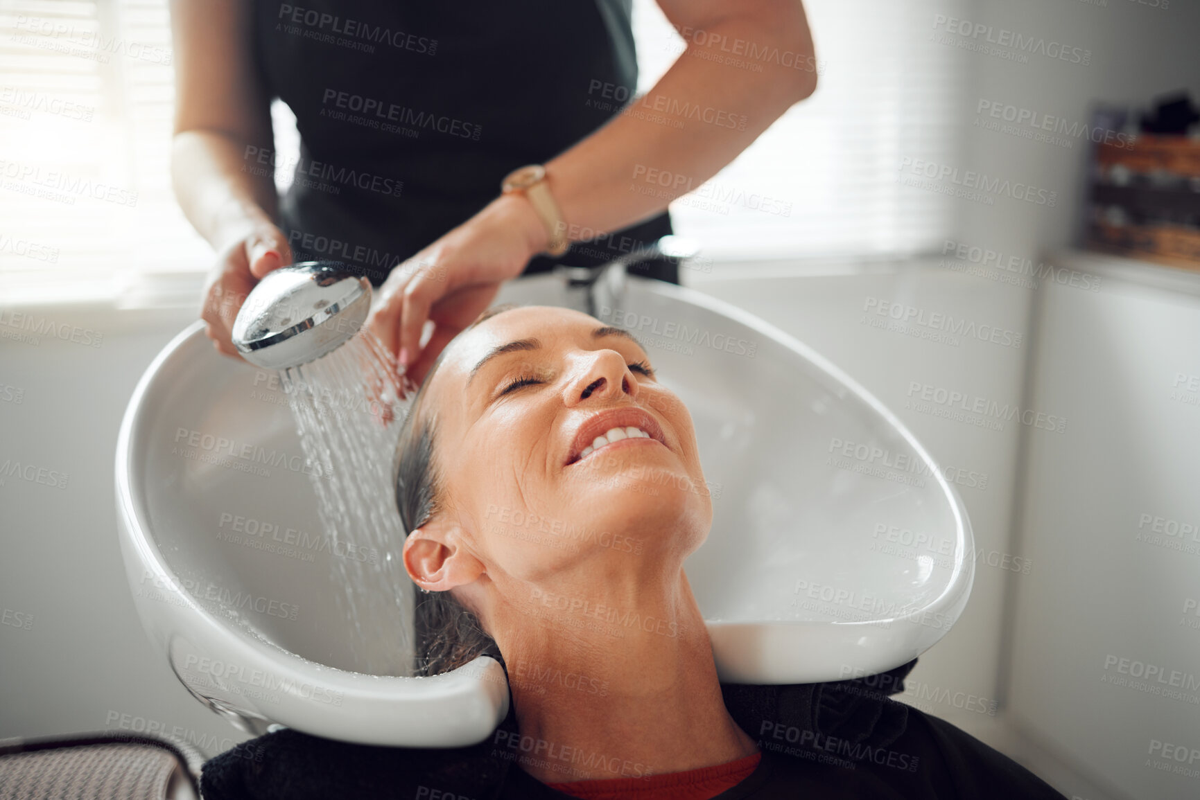 Buy stock photo Beauty salon, woman customer and washing hair, service cleaning and scalp treatment at water basin. Professional hairdresser, hair care stylist and cosmetics wellness boutique rinse happy client head