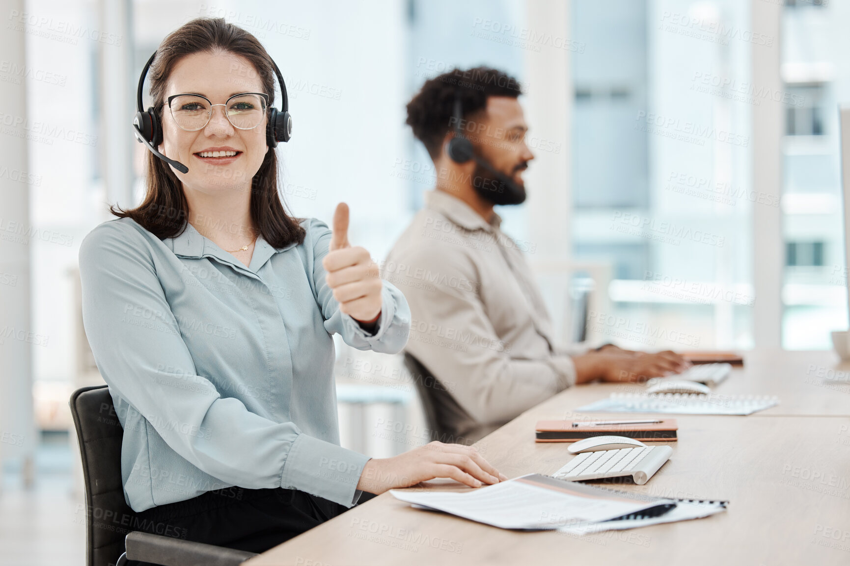 Buy stock photo Call center, customer service and thumbs up with a woman consultant working at a desk in her office. Contact us, crm and support with a happy female at work in sales, consulting or telemarketing