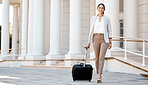 Travel, suitcase and business woman in city portrait walking outdoor for international career opportunity or entrepreneurship. Wealth, class corporate executive or lawyer and luggage for company trip