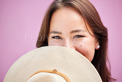 Buy stock photo Fashion, woman and shy face with straw hat on pink studio background. Portrait, happy or beauty, mysterious and Asian model from Japan cover or hiding in cool, retro or stylish, vintage or summer hat