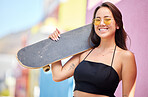 Skateboard, girl and in city for summer outdoor day with casual, edgy or trendy look with retro sunglasses. Portrait, skater woman or young female cool, funky or smile being happy, relax and smile.