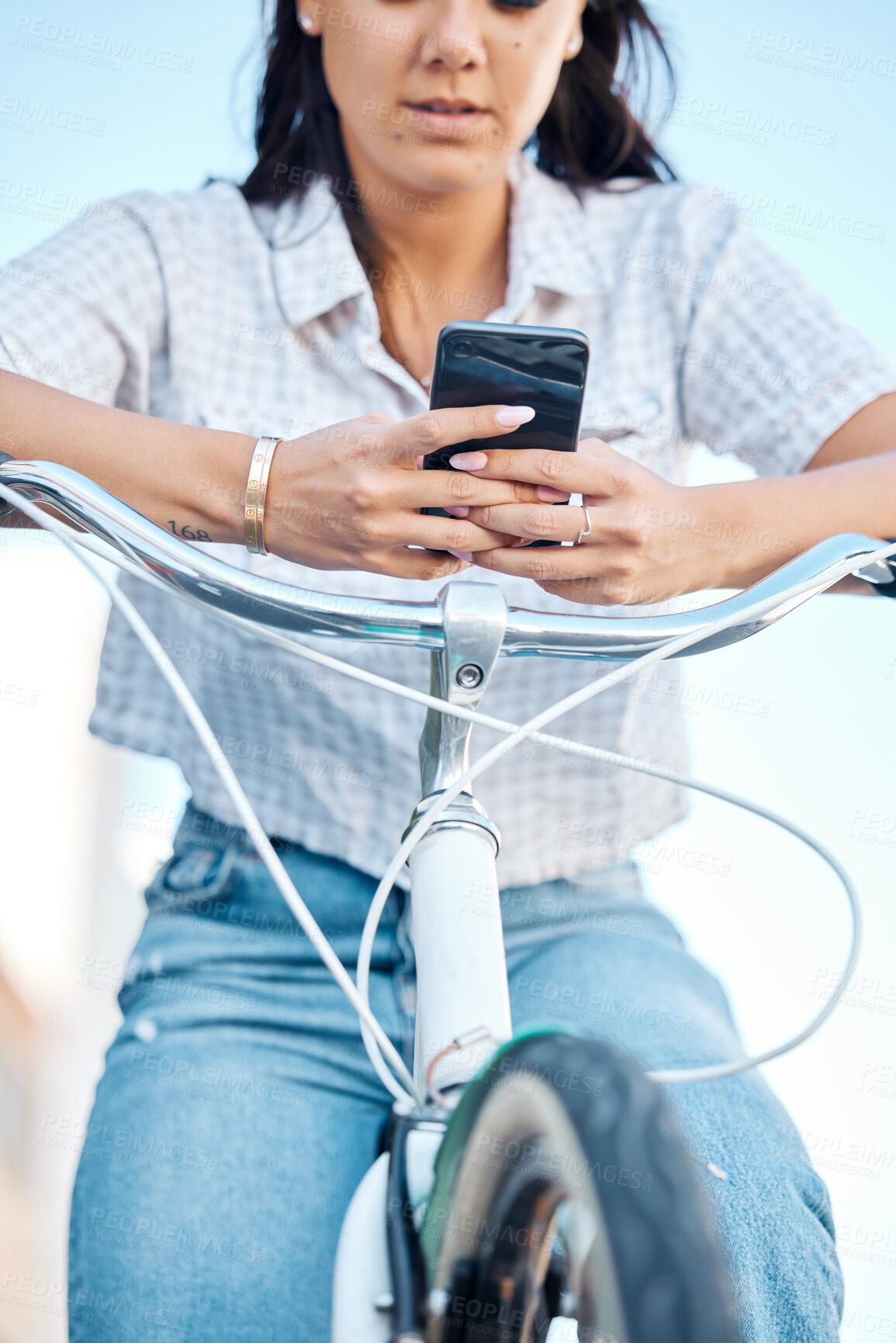 Buy stock photo Hands, phone and woman on bike for city travel, eco friendly and future environment energy transport in Japan. Fashion student, cool model and mobile technology for social media, gps or location map