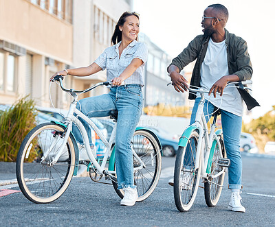 Couple in street, bicycle and eco friendly travel, happy and clean carbon footprint in cityscape. Environment, transportation and urban, young man and woman, health and fitness, wellness and exercise